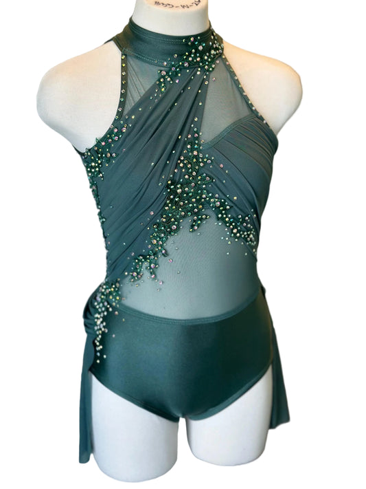 A child large-sized green lyrical costume with applique and rhinestone embellishments on a mannequin.