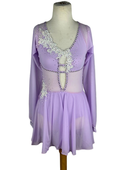 Lavender dance costume with sequined top on a mannequin against a white background