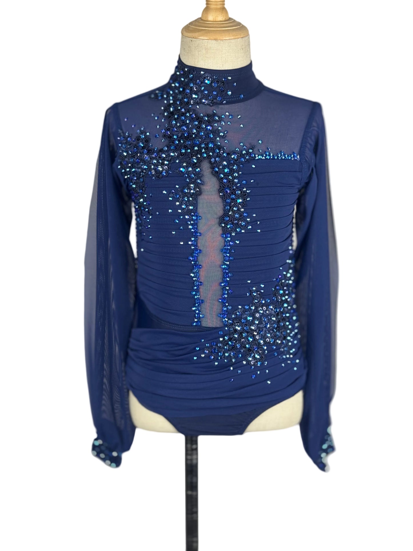 Blue rhinestoned lyrical dance costume on a mannequin against a white background