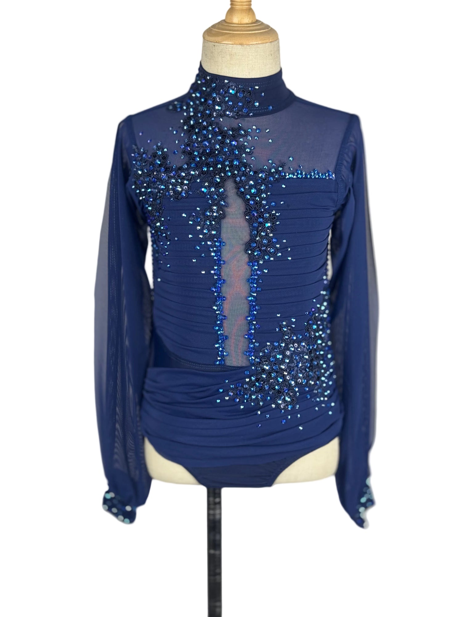Blue rhinestoned lyrical dance costume on a mannequin against a white background
