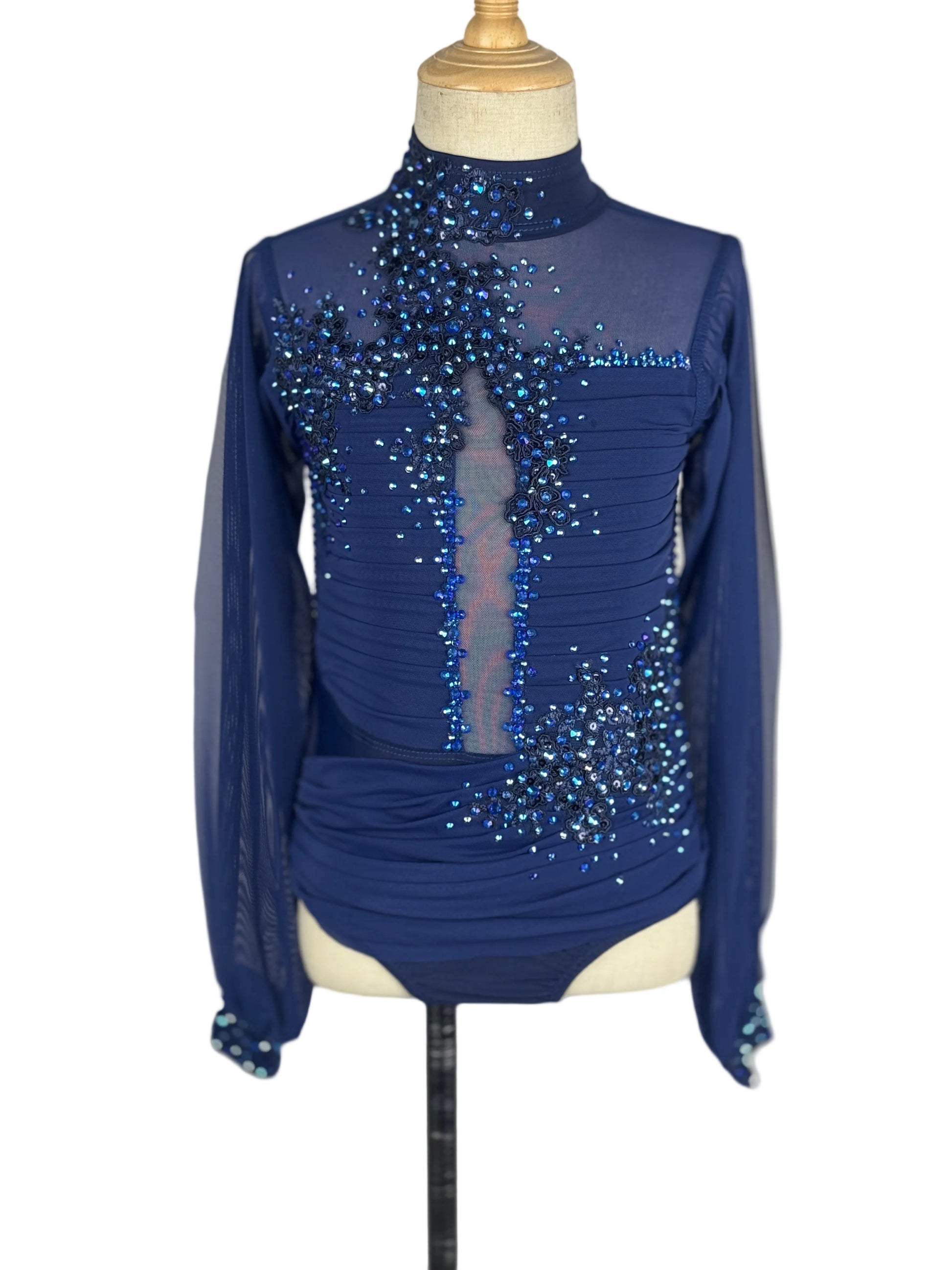 Blue rhinestoned lyrical dance costume on a mannequin against a white background