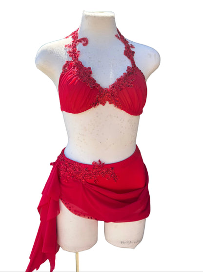 A red two-piece lyrical dance costume against a white background.