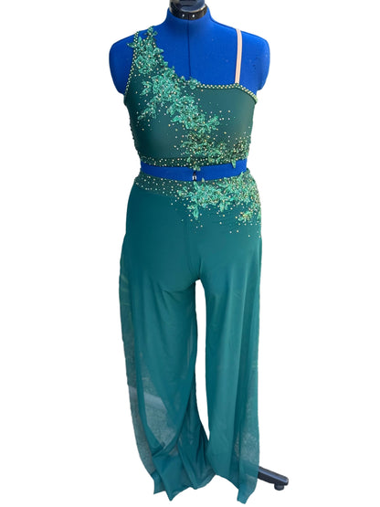 Green dance costume on a mannequin against a white background