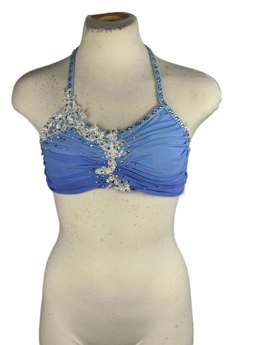 Blue halter top with crystal embellishments on a mannequin against a white background